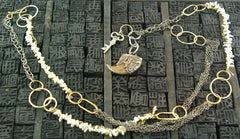 Melissa Joy Manning 14 K Yellow Gold and Pearl Necklace , with Key and Petrified Charm
