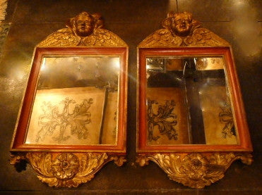 Pair of Italian Baroque Style Cherub Mirrors in Terra Cotta Tones and Parcel Gilt